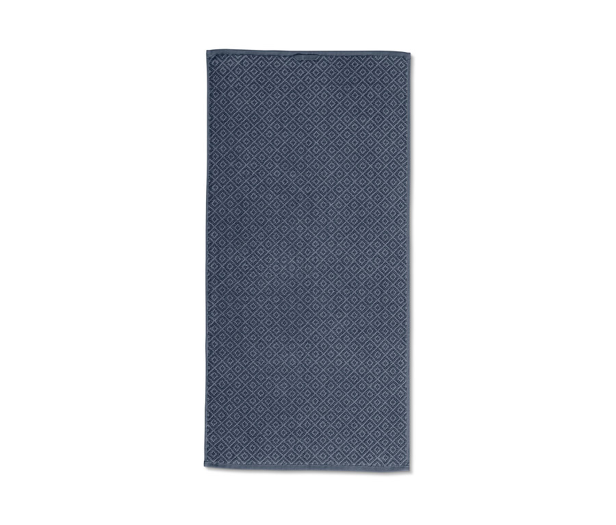 Blaues Jacquard-Handtuch mit geometrischem Muster.