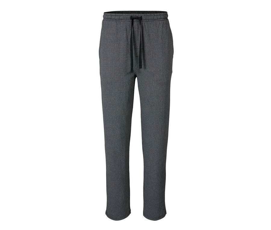 Eine graue Pyjamahose mit Muster und Kordelzug in der Taille.