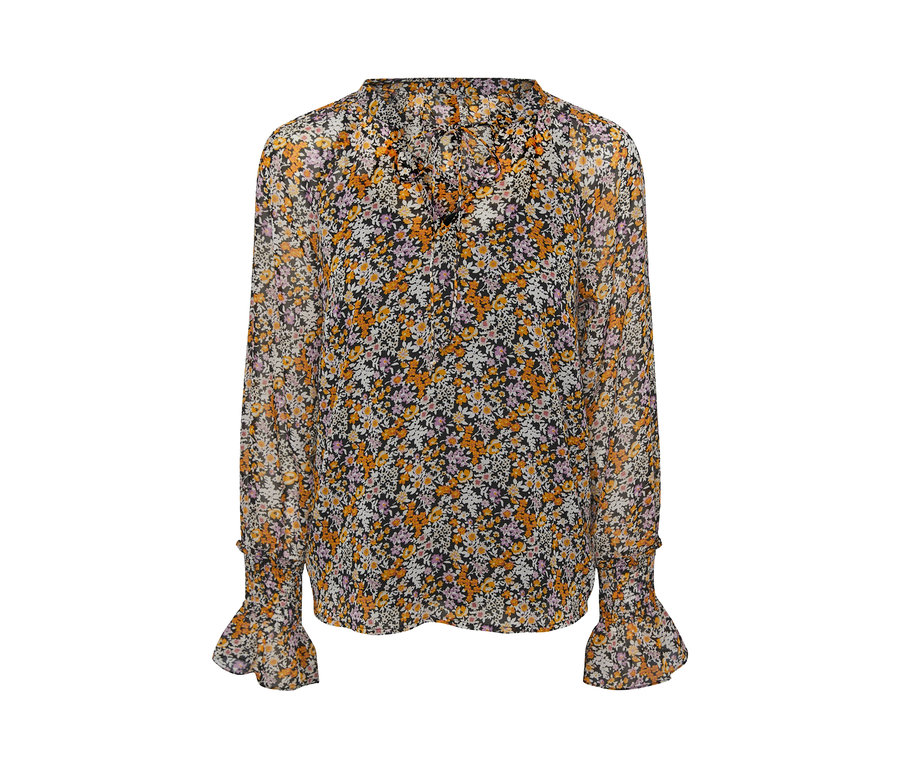 Eine Bluse mit Print, langen Ärmeln und Rüschen.
