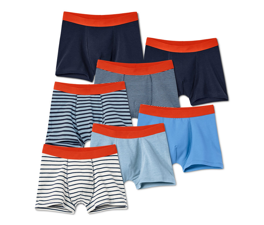 Sieben blaue Jungen-Slipboxer mit orangefarbenem Bund.