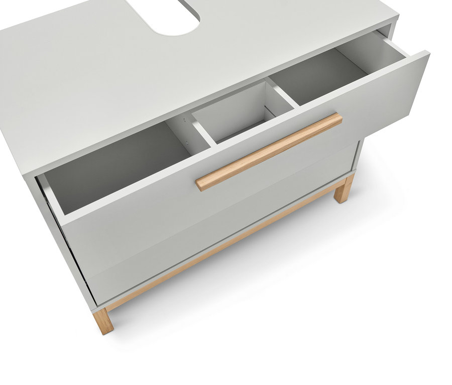 Detailansicht eines hellgrauen Waschbecken-Unterschranks »Eklund« mit zwei Schubladen, von denen eine geöffnet ist.