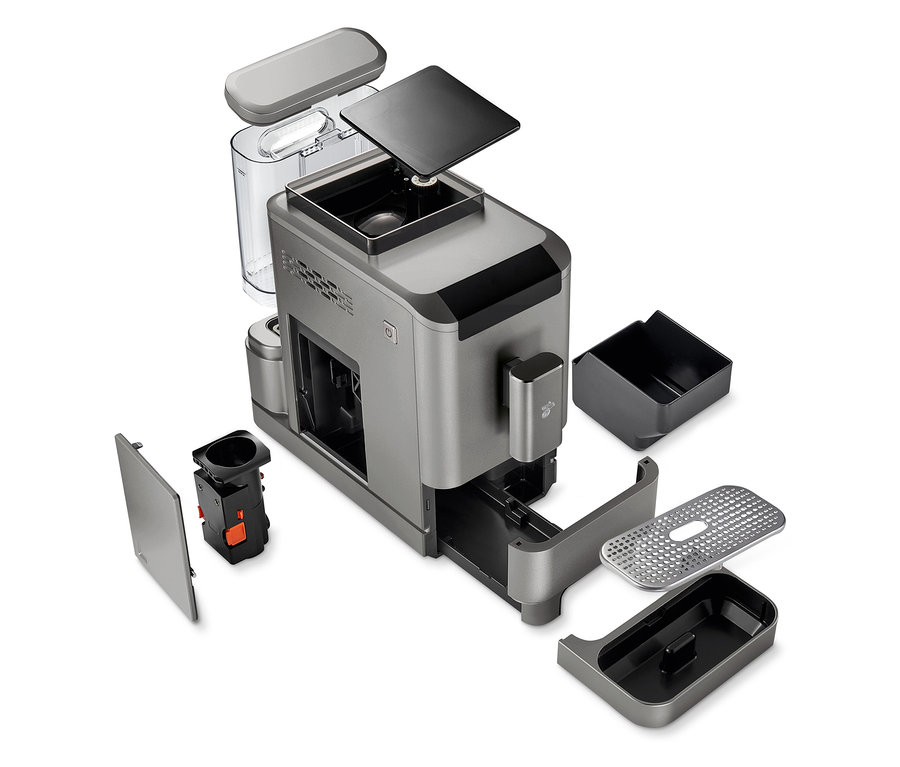 Teilweise zerlegter »Esperto2 Caffè« Kaffeevollautomat in Titanium Silver mit verschiedenen abgenommenen Teilen.