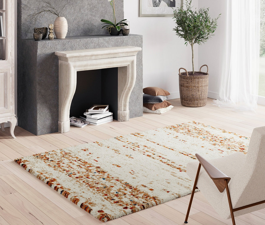 Wohnzimmer mit beigem Teppich »Himalaya«.