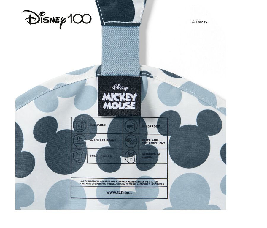 Detail der blauen Kleinkind-Thermo-Regenhose »Micky« mit Mickey Mouse-Muster.