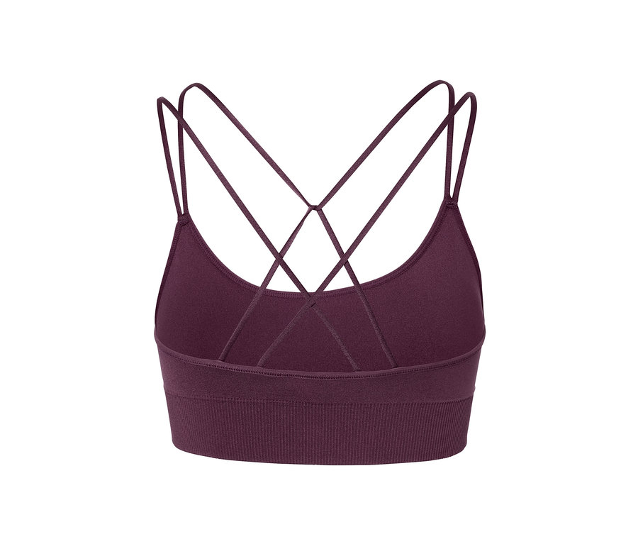 Detailaufnahme eines lilafarbenen Seamless-Sport-Bustiers mit gekreuzten Trägern am Rücken.