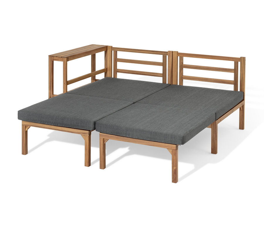 Flexible Lounge-Ecke »Tinus« mit ausziehbaren Fußlehnen und grauen Auflagen.