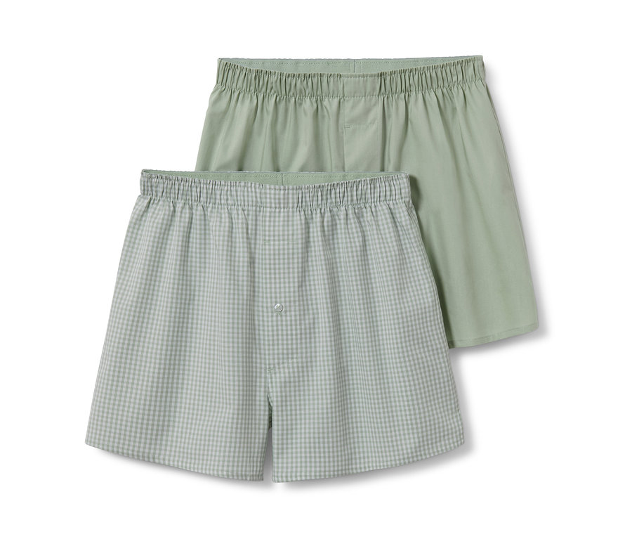 Zwei grüne Web-Boxershorts.