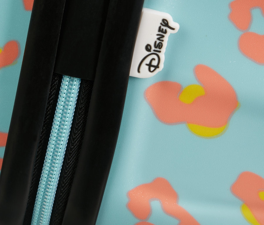 Detailaufnahme eines großen American Tourister Wavebreaker »Minnie Mouse« Koffers mit blauem Reißverschluss und Muster.