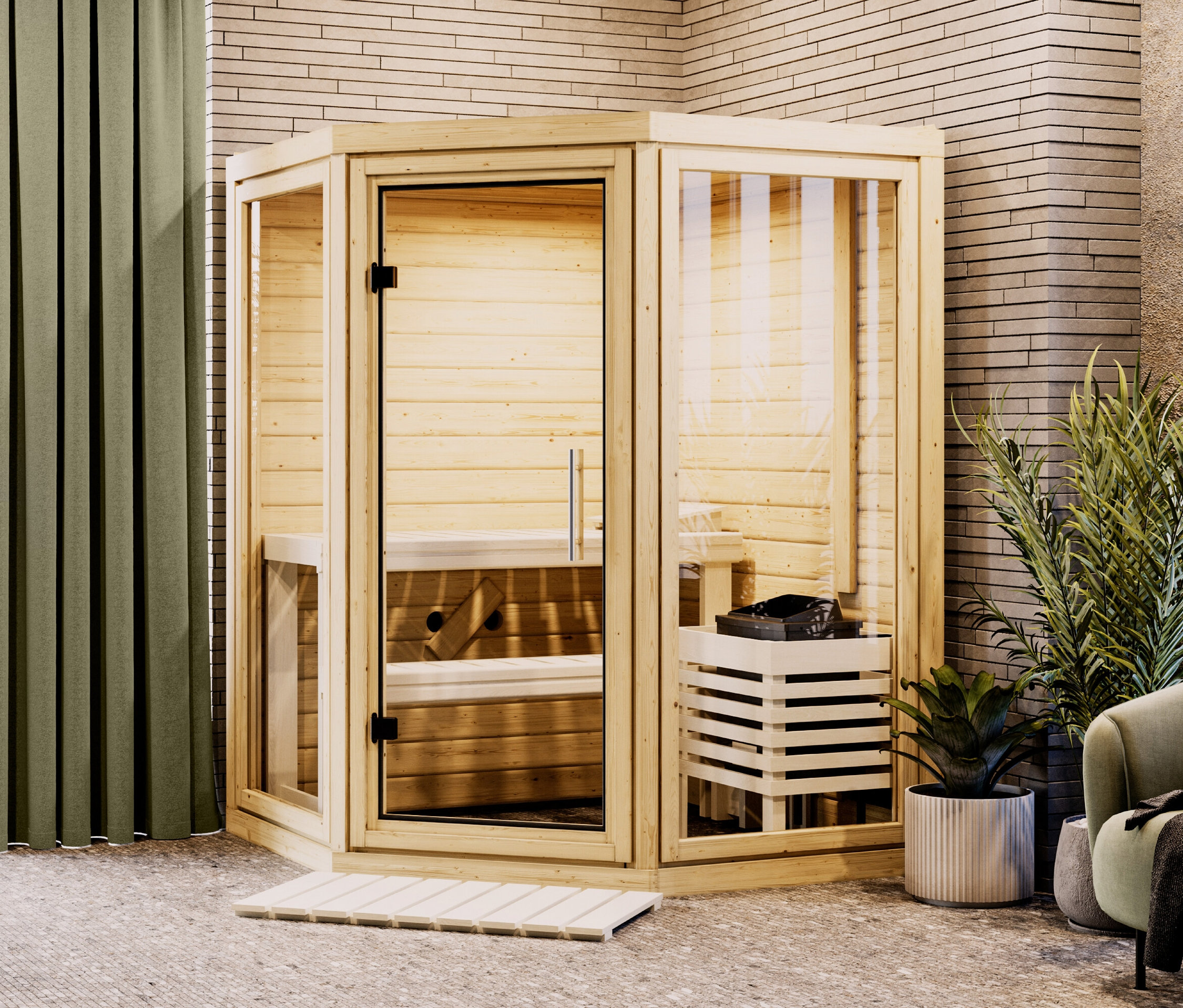 Innenraum mit einer Holzsauna, daneben ein Sessel und Pflanzen.
