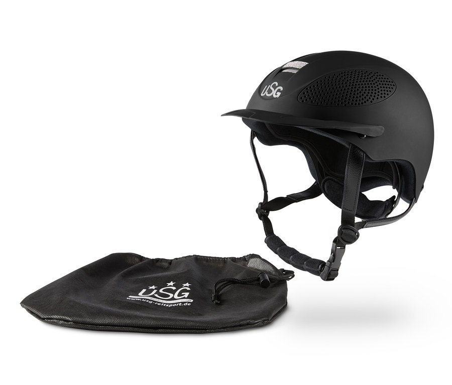 Ein schwarzer USG-Reithelm neben einer schwarzen USG-Tasche.