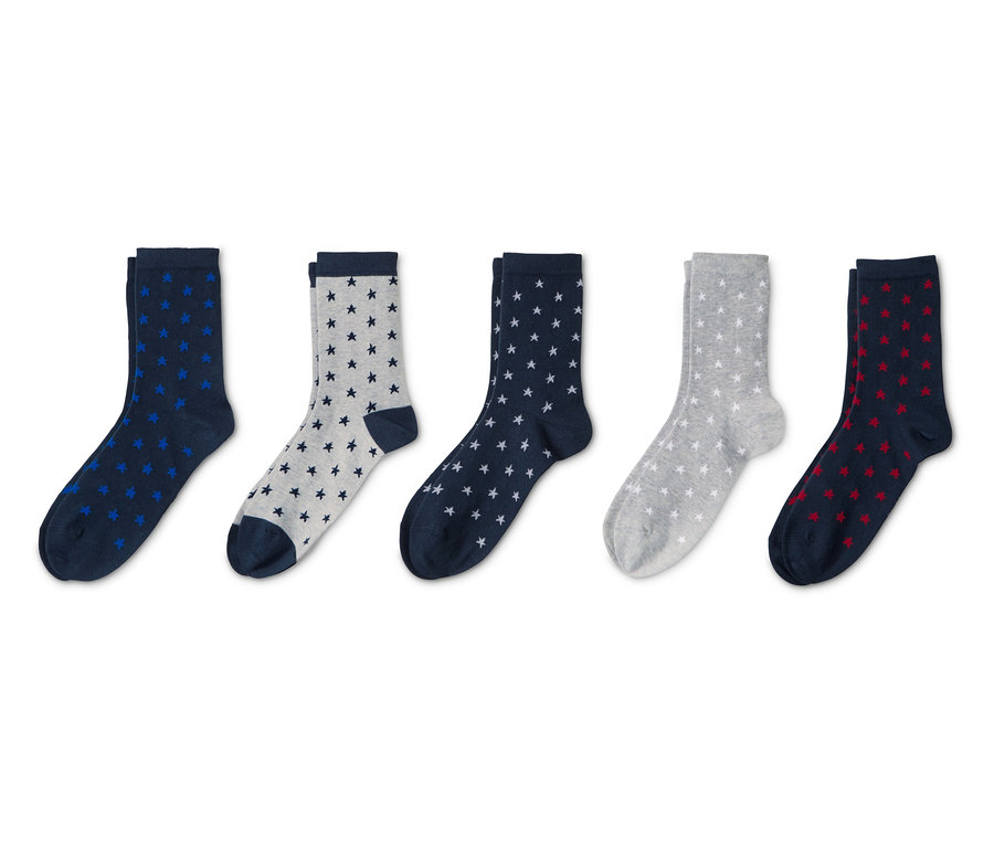 Fünf Paar Socken mit Sternen.