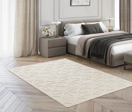 Schlafzimmer mit einem cremefarbenen Teppich »Cosmo« Geo.