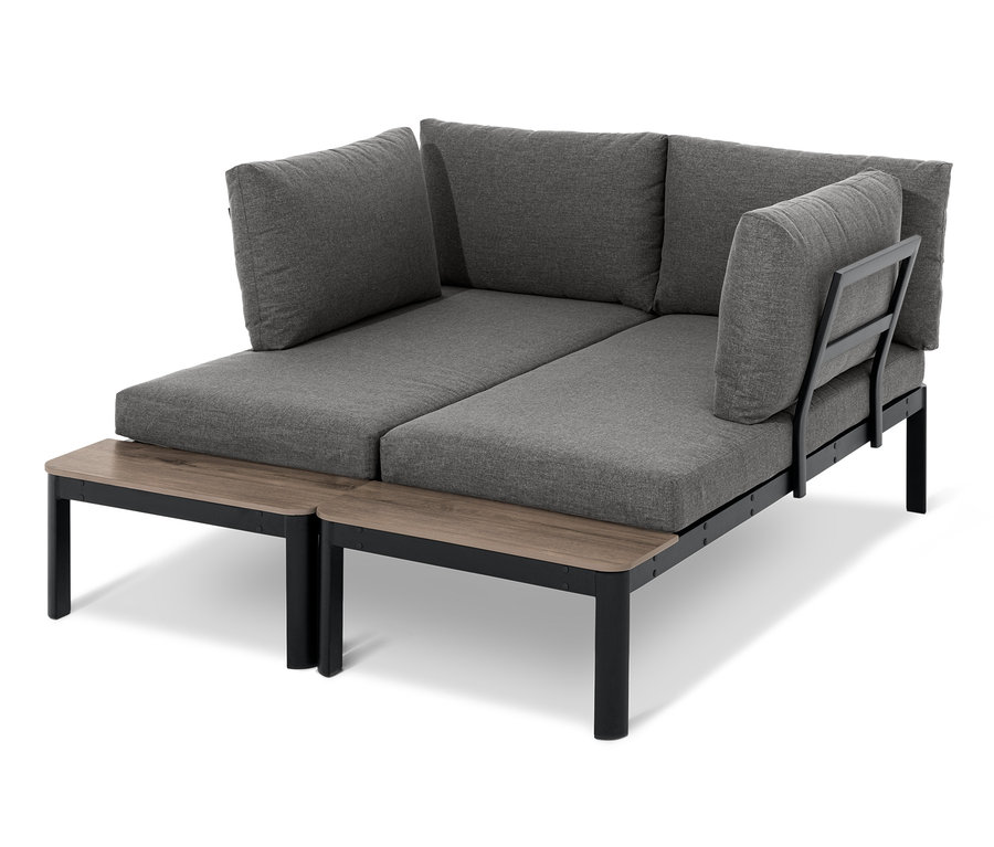 Flexible Lounge-Ecke mit Duraboard®-Tischplatten und grauen Kissen.