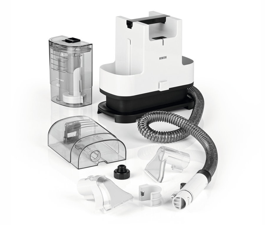 Ein N8Werk Teppich- und Polsterreiniger »3522« mit verschiedenen Aufsätzen liegt auseinandergebaut da.