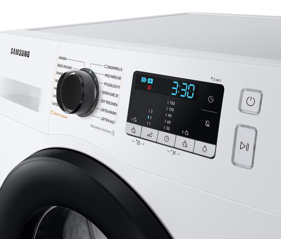 Detailaufnahme eines weißen Samsung Wärmepumpentrockners DV9ETA040AE/EG mit schwarzer Tür und Bedienfeld.