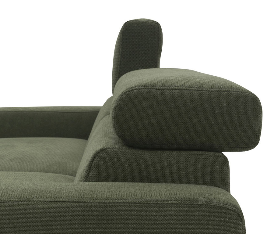 Detailansicht des grünen DOMO collection Sofas (rechts).