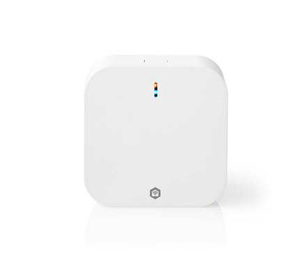 Weißes rechteckiges Smart-Home-Gerät mit abgerundeten Ecken, einer mehrfarbigen LED-Anzeige oben und einem grauen Haus-mit-WLAN-Logo unten.
