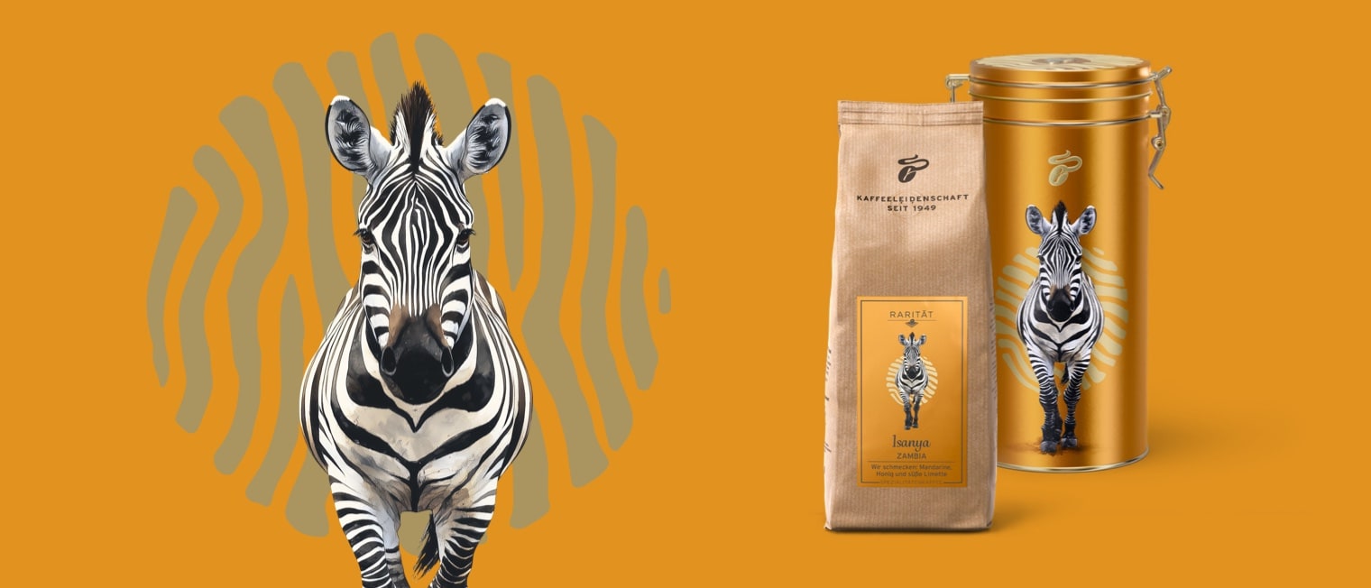 Man sieht eine Kaffeeverpackung inkl. Kaffeedose abgebildet neben einer Zebra Illustration.','Enter picture alt'}