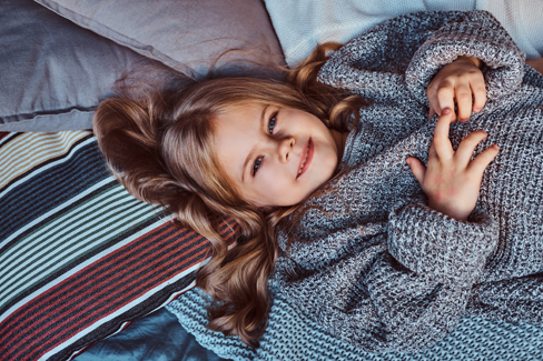 Kinder-Pullover können Sie ruhig eine Nummer größer kaufen.