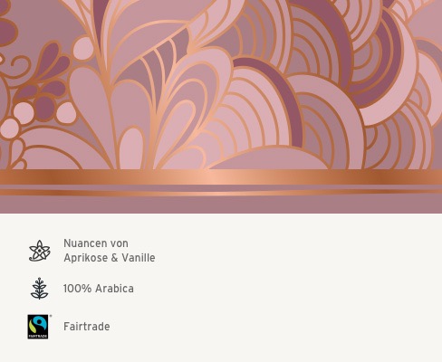 Im Hinergrund die Ornamente der Verpackung. Geschmacksprofil: Nuancen von Aprikose und Vanille