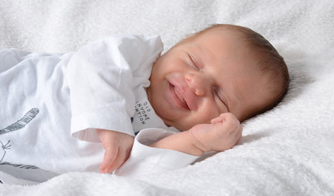 Tchibo setzt bei Baby-Schlafanzügen auf Bio-Baumwolle und nachhaltige Produktion.